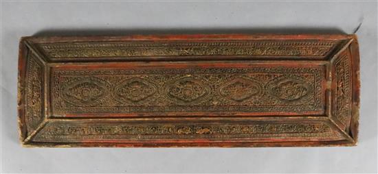 A Tibetan carved panel, 18th/19th century, 72.5cm x 24cm